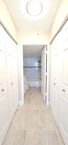 a view of a room with a en suite bathroom