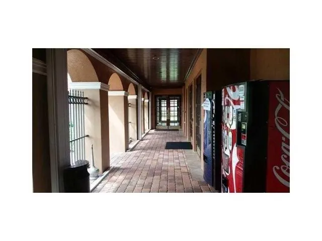 a view of a living room with furniture