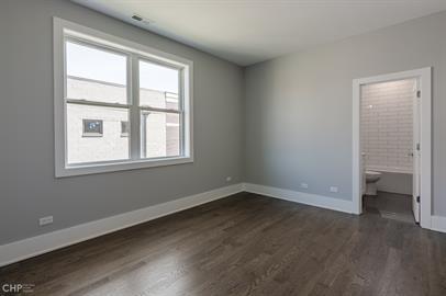 562 West 18th Street, Unit 3W Chicago, IL 60616 - Photo 11 of 14 an empty room with a window