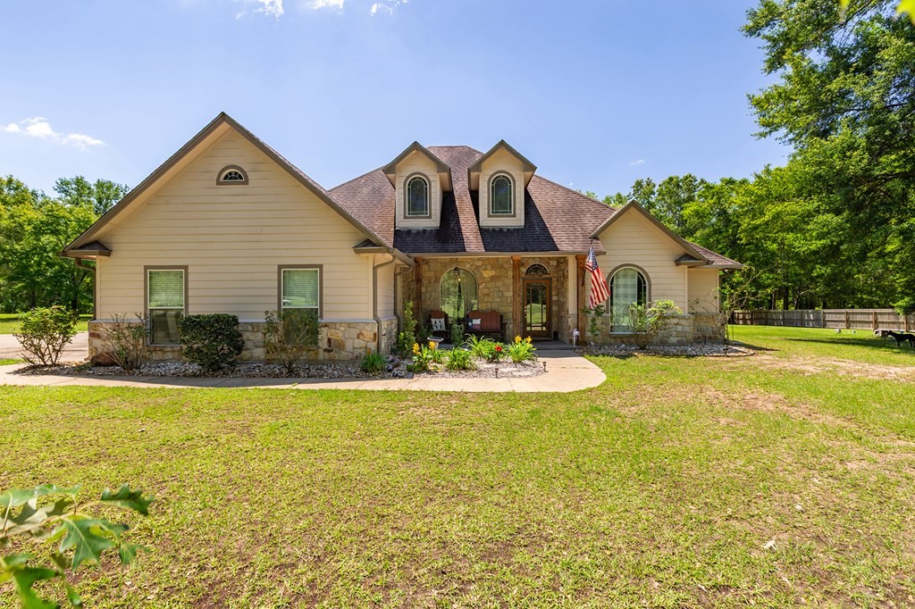 1171 Old Ewing Road Lufkin, TX 75901 - Photo 40 of 49 a front view of house with yard and swimming pool