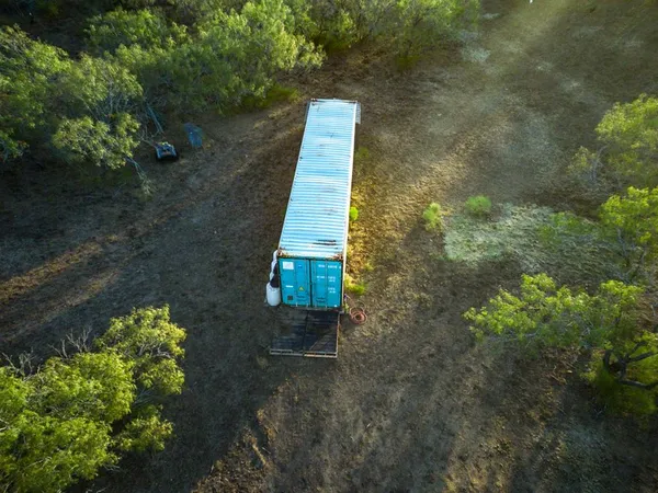 a view of house with a yard