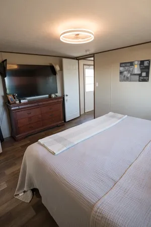 a view of a livingroom with furniture and window