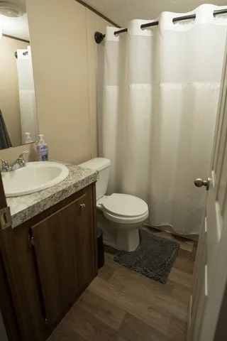 a kitchen with sink and granite