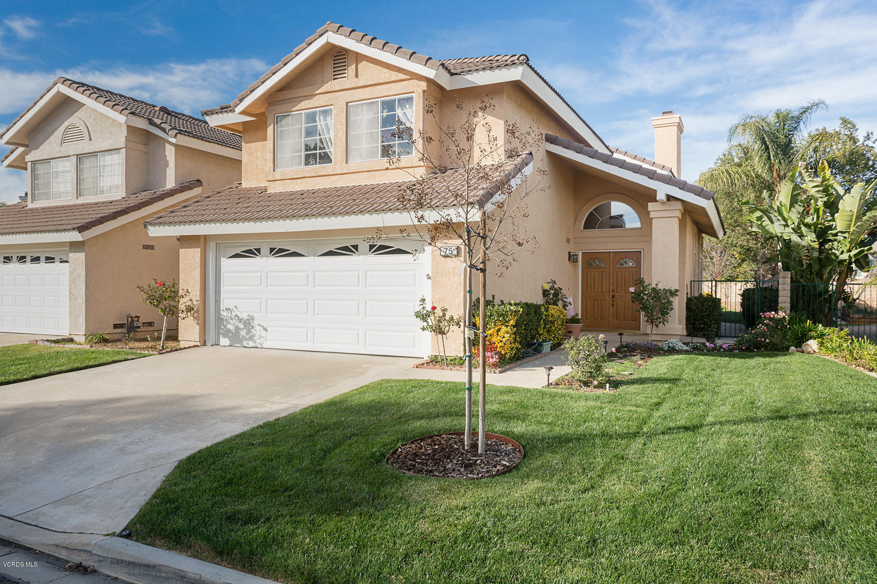 75 Valley Crest Road Simi Valley, CA 93065 - Photo 1 of 33 a front view of a house with a garden