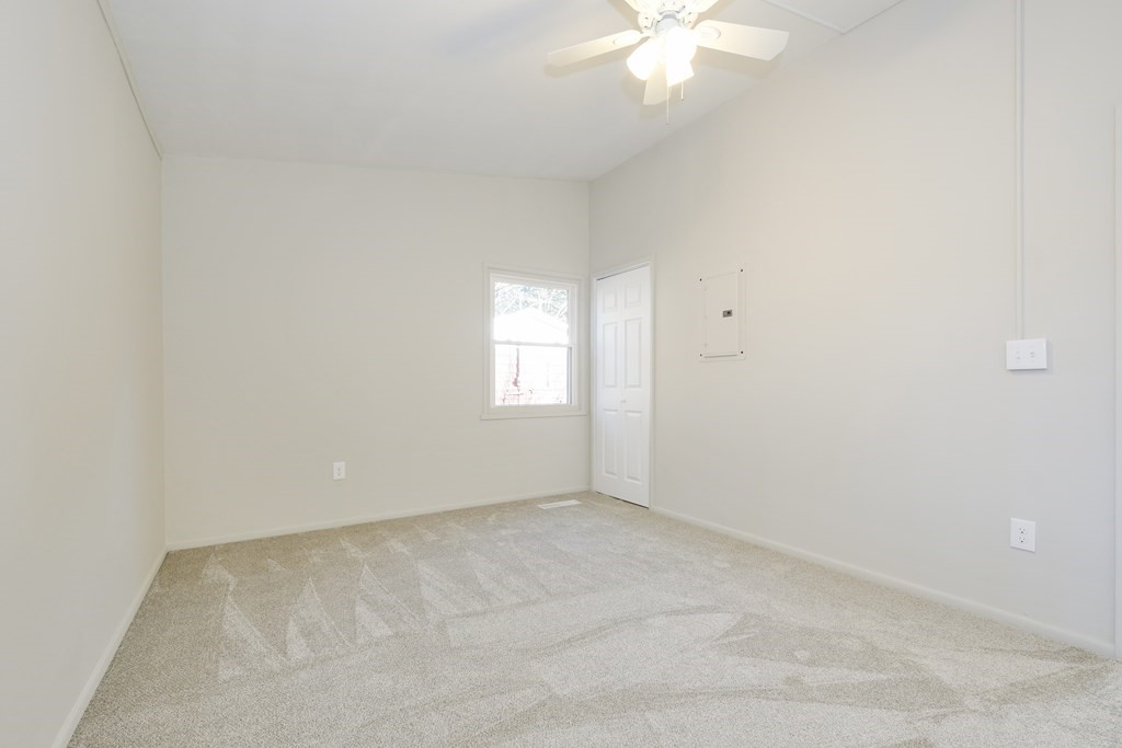 1261 Burts Pit Road Northampton, MA 01062 - Photo 16 of 21 an empty room with windows and fan
