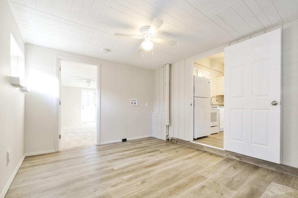 1261 Burts Pit Road Northampton, MA 01062 - Photo 19 of 21 a view of a room with wooden floor and white walls