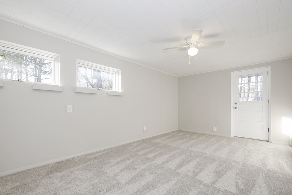 1261 Burts Pit Road Northampton, MA 01062 - Photo 20 of 21 a view of an empty room with a window