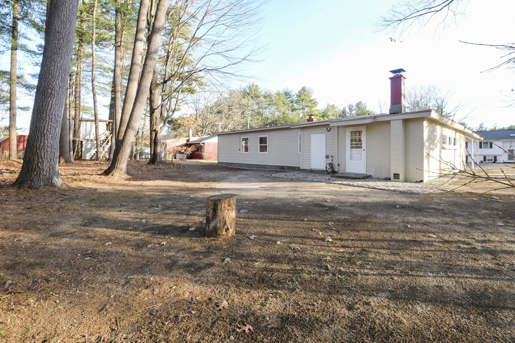1261 Burts Pit Road Northampton, MA 01062 - Photo 21 of 21 a front view of a house with a yard