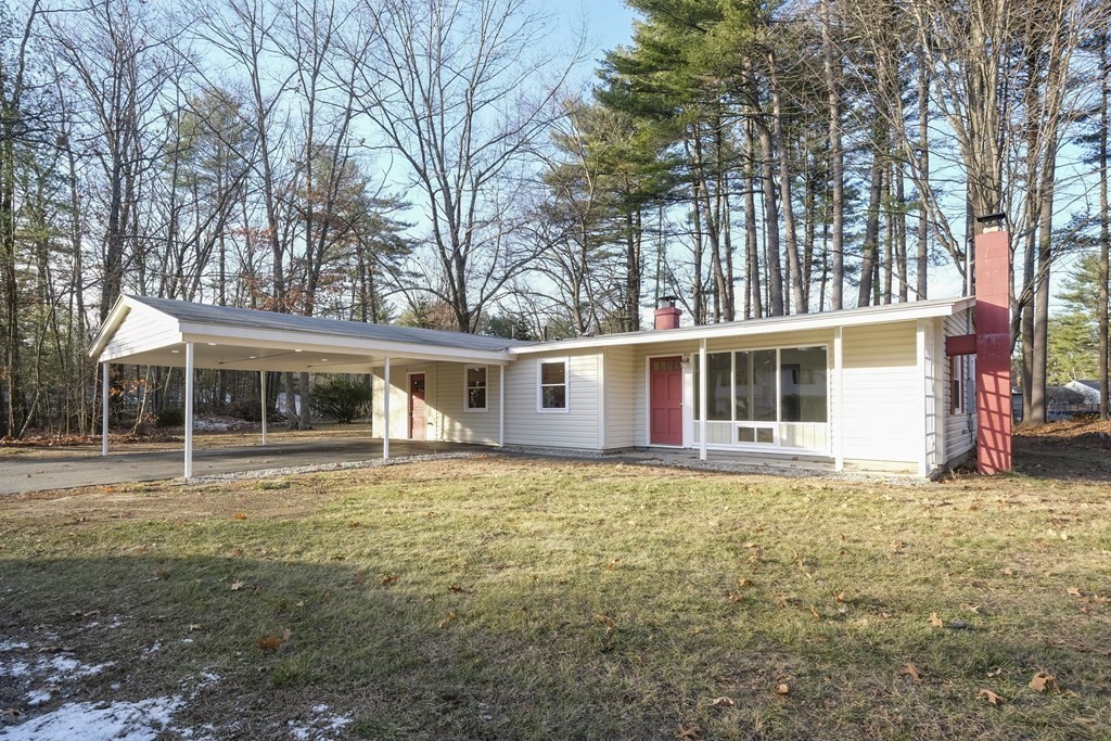 1261 Burts Pit Road Northampton, MA 01062 - Photo 3 of 21 a front view of a house with a garden