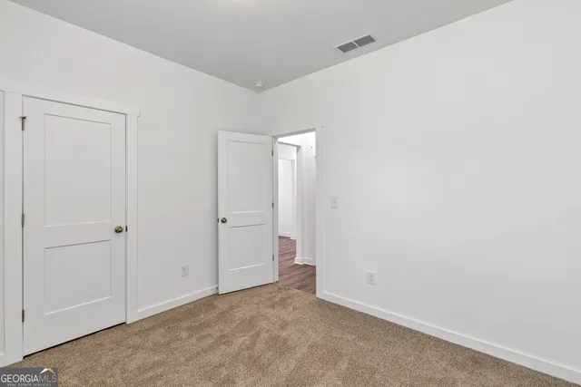 a view of a room with racks on the wall