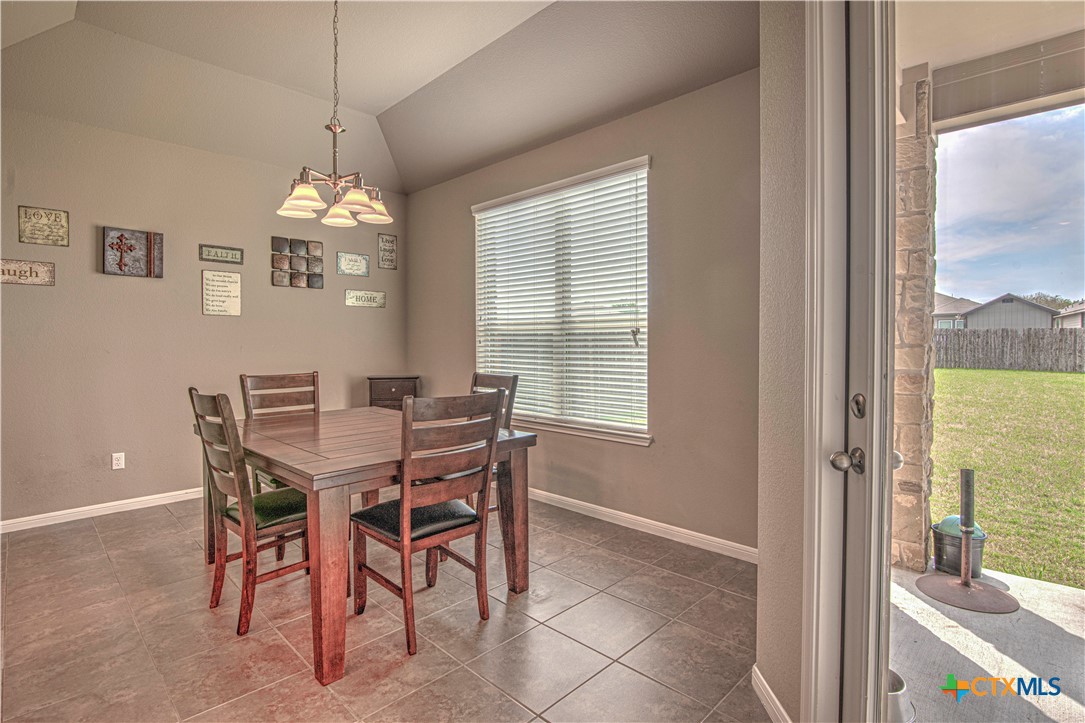 623 Coventry Drive Temple, TX 76502 - Photo 12 of 38 a view of a dining room with furniture window and outside view