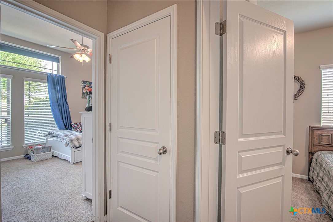 623 Coventry Drive Temple, TX 76502 - Photo 22 of 38 a view of bedroom with a large window and hardwood floor