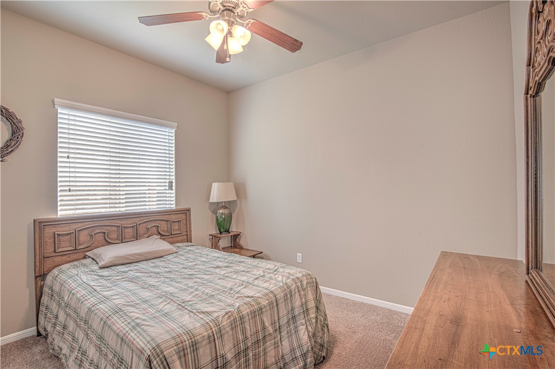 623 Coventry Drive Temple, TX 76502 - Photo 23 of 38 a bedroom with a bed and a window
