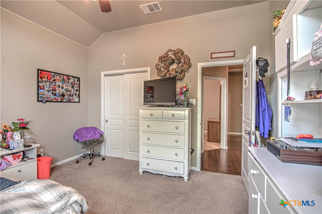 623 Coventry Drive Temple, TX 76502 - Photo 25 of 38 a bedroom with a bed and a tv
