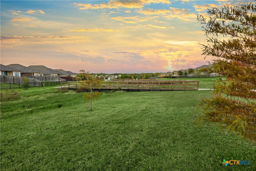 623 Coventry Drive Temple, TX 76502 - Photo 34 of 38 a view of a lake with a houses