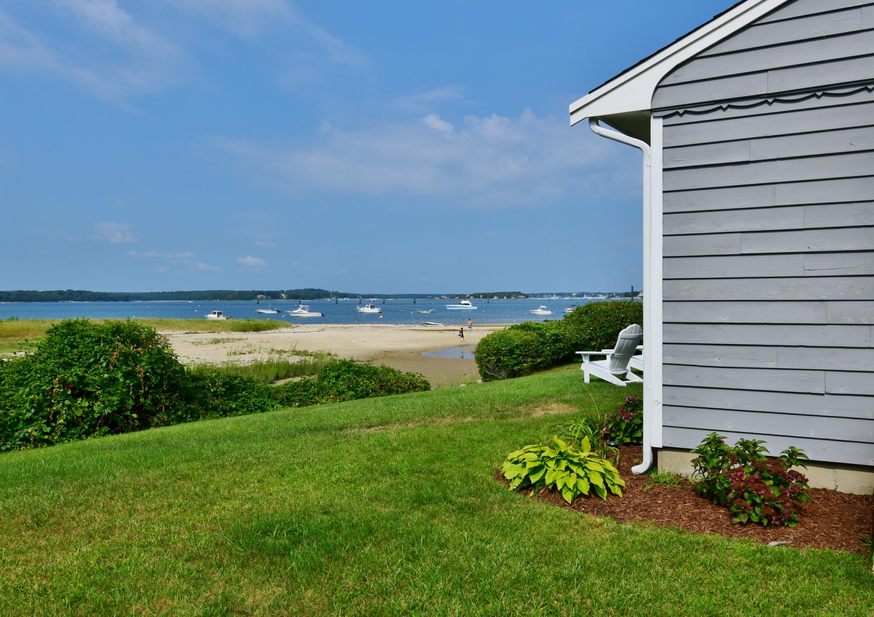 5 Spindrift Lane, Unit WINTER Buzzards Bay, MA 02532 - Photo 6 of 34 a view of a garden with an outdoor space