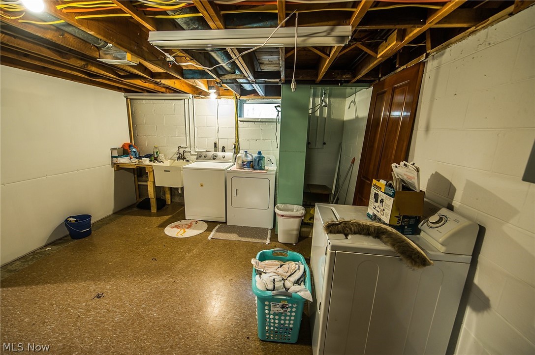 10744 Johnnycake Ridge Road Painesville, OH 44077 - Photo 29 of 31 Laundry area has a full functioning shower