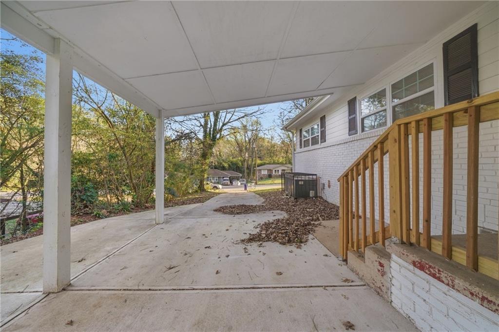 3024 Pasadena Drive Decatur, GA 30032 - Photo 2 of 28 a view of a porch with wooden floor and iron stairs