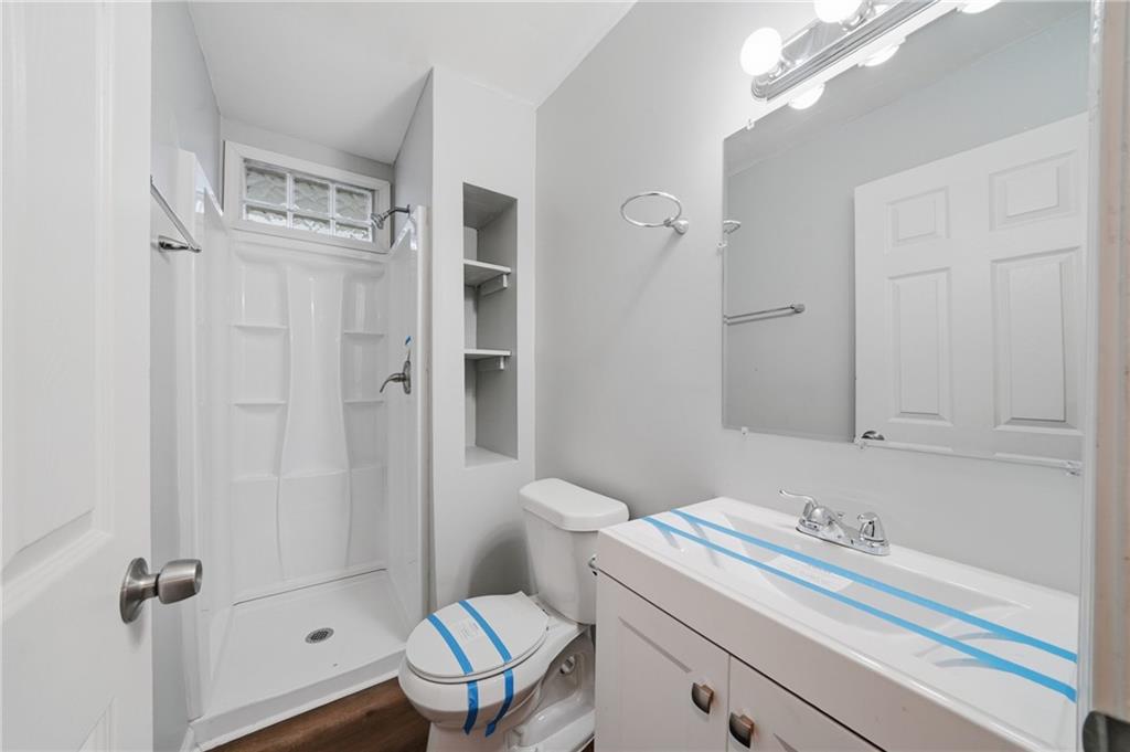 3024 Pasadena Drive Decatur, GA 30032 - Photo 23 of 28 a bathroom with a sink a toilet and shower
