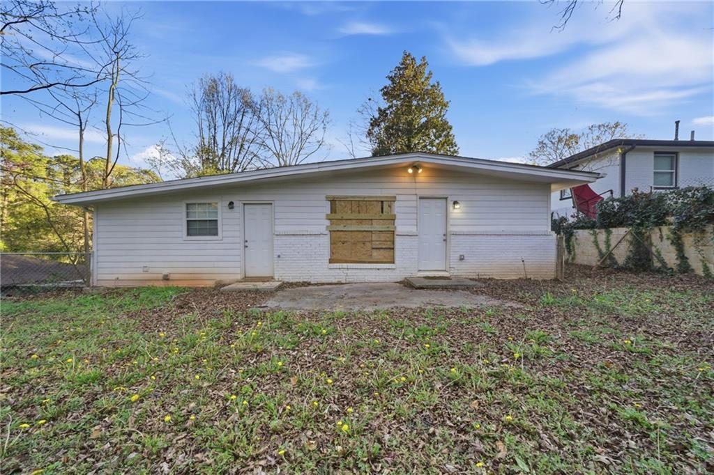 3024 Pasadena Drive Decatur, GA 30032 - Photo 27 of 28 a front view of a house with a yard