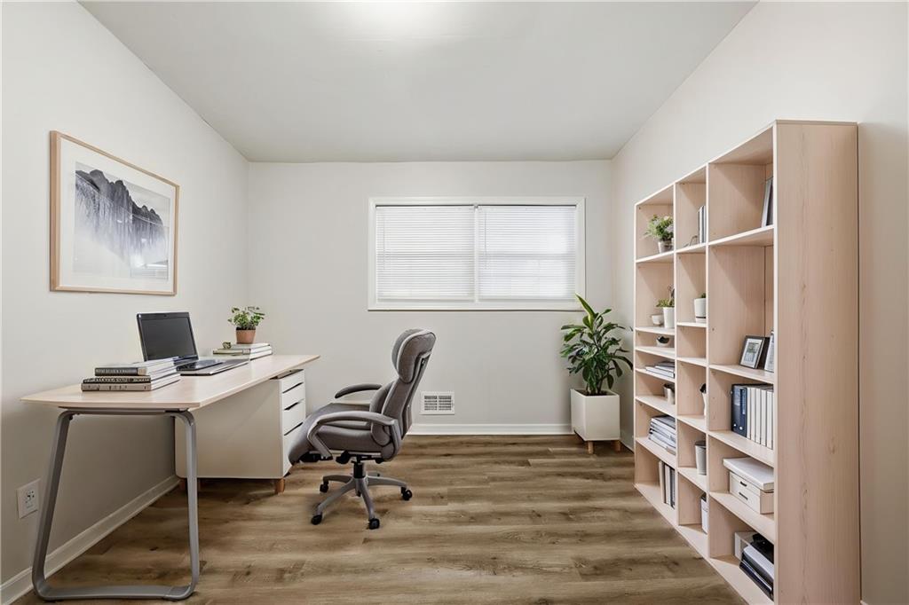 3024 Pasadena Drive Decatur, GA 30032 - Photo 5 of 28 a view of a workspace with furniture and a window