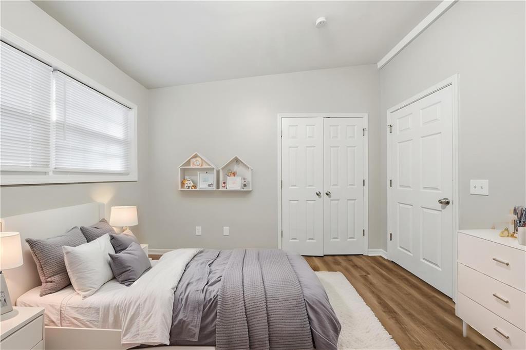 3024 Pasadena Drive Decatur, GA 30032 - Photo 6 of 28 a bedroom with a bed and a window