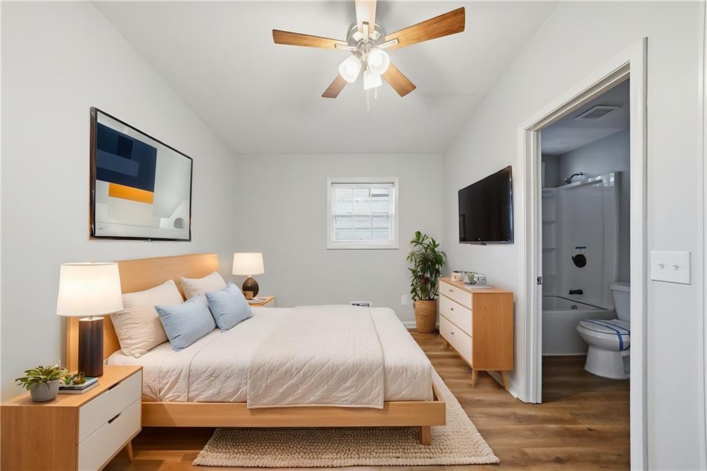 3024 Pasadena Drive Decatur, GA 30032 - Photo 7 of 28 a bedroom with a bed and a flat screen tv