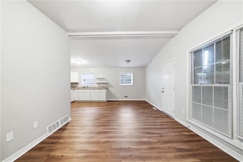 3024 Pasadena Drive Decatur, GA 30032 - Photo 9 of 28 a view of empty room with wooden floor and windows