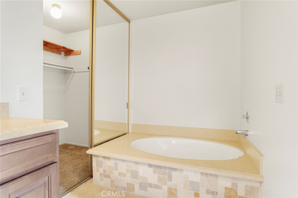 3488 Radcliffe Road Thousand Oaks, CA 91360 - Photo 18 of 23 a bathroom with a bathtub and a sink