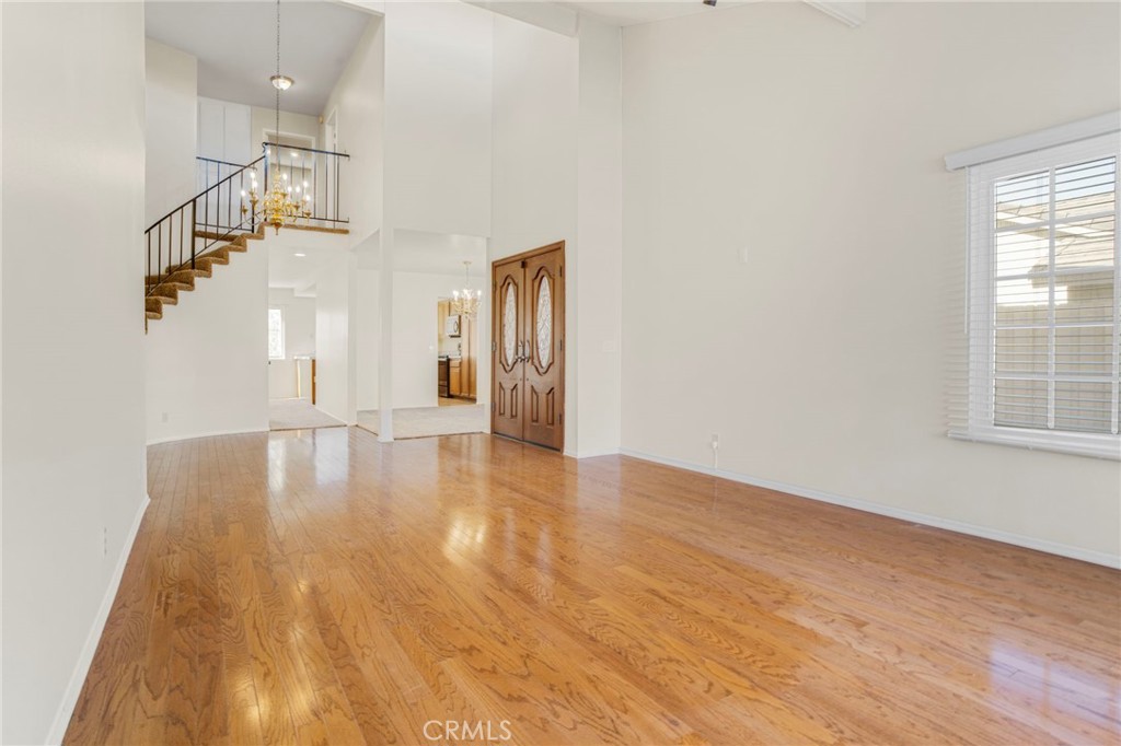 3488 Radcliffe Road Thousand Oaks, CA 91360 - Photo 6 of 23 a view of empty room with wooden floor and fan
