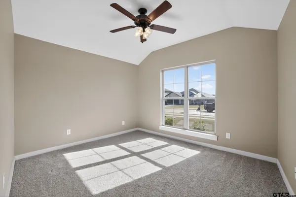 a view of workspace with window and a ceiling fan
