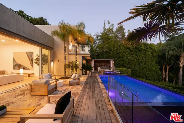 a view of a building with a swimming pool