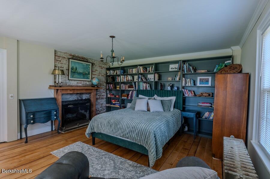 10 Goodell Road Lanesborough, MA 01237 - Photo 12 of 67 a bedroom with a large bed and a book shelf