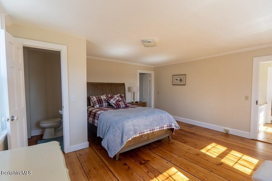 10 Goodell Road Lanesborough, MA 01237 - Photo 17 of 67 a bedroom with a bed and a window