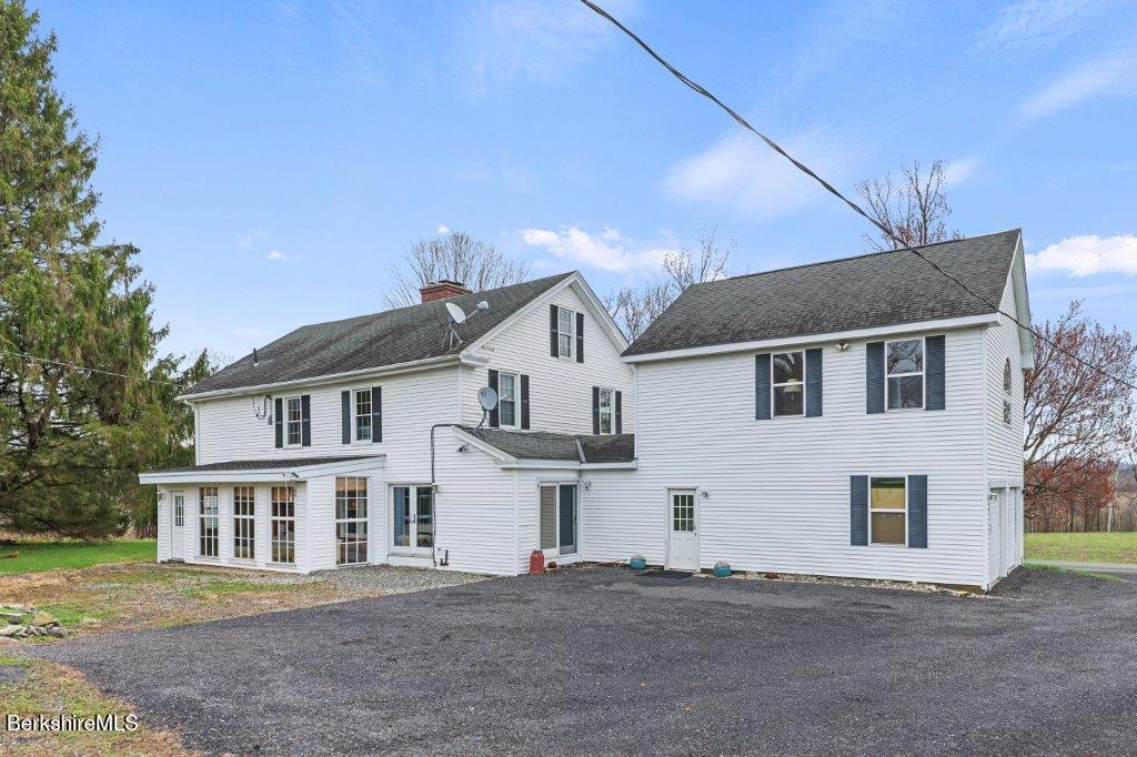 10 Goodell Road Lanesborough, MA 01237 - Photo 3 of 67 a front view of a house with a street