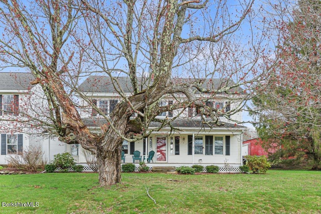 10 Goodell Road Lanesborough, MA 01237 - Photo 34 of 67 a front view of house with yard and green space