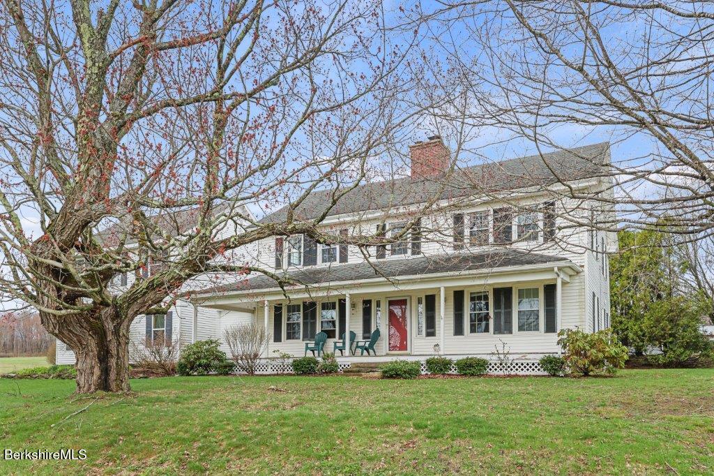 10 Goodell Road Lanesborough, MA 01237 - Photo 35 of 67 a front view of a building with a garden
