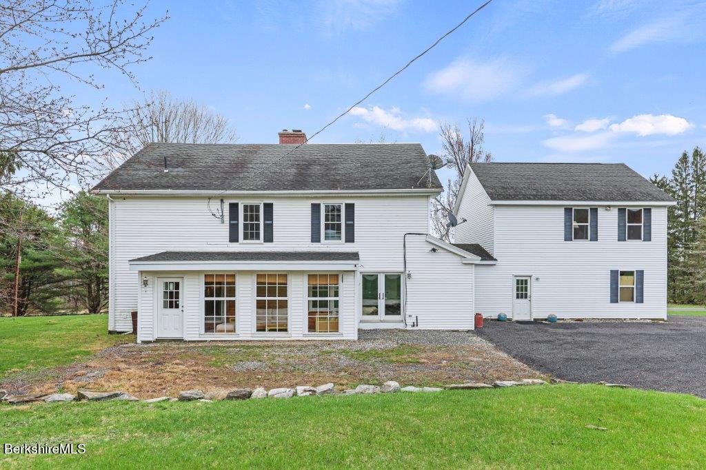 10 Goodell Road Lanesborough, MA 01237 - Photo 36 of 67 front view of a house and a yard