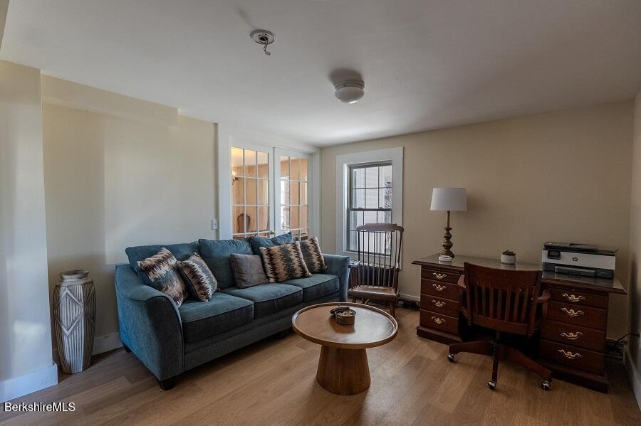 10 Goodell Road Lanesborough, MA 01237 - Photo 9 of 67 a living room with furniture and a wooden floor