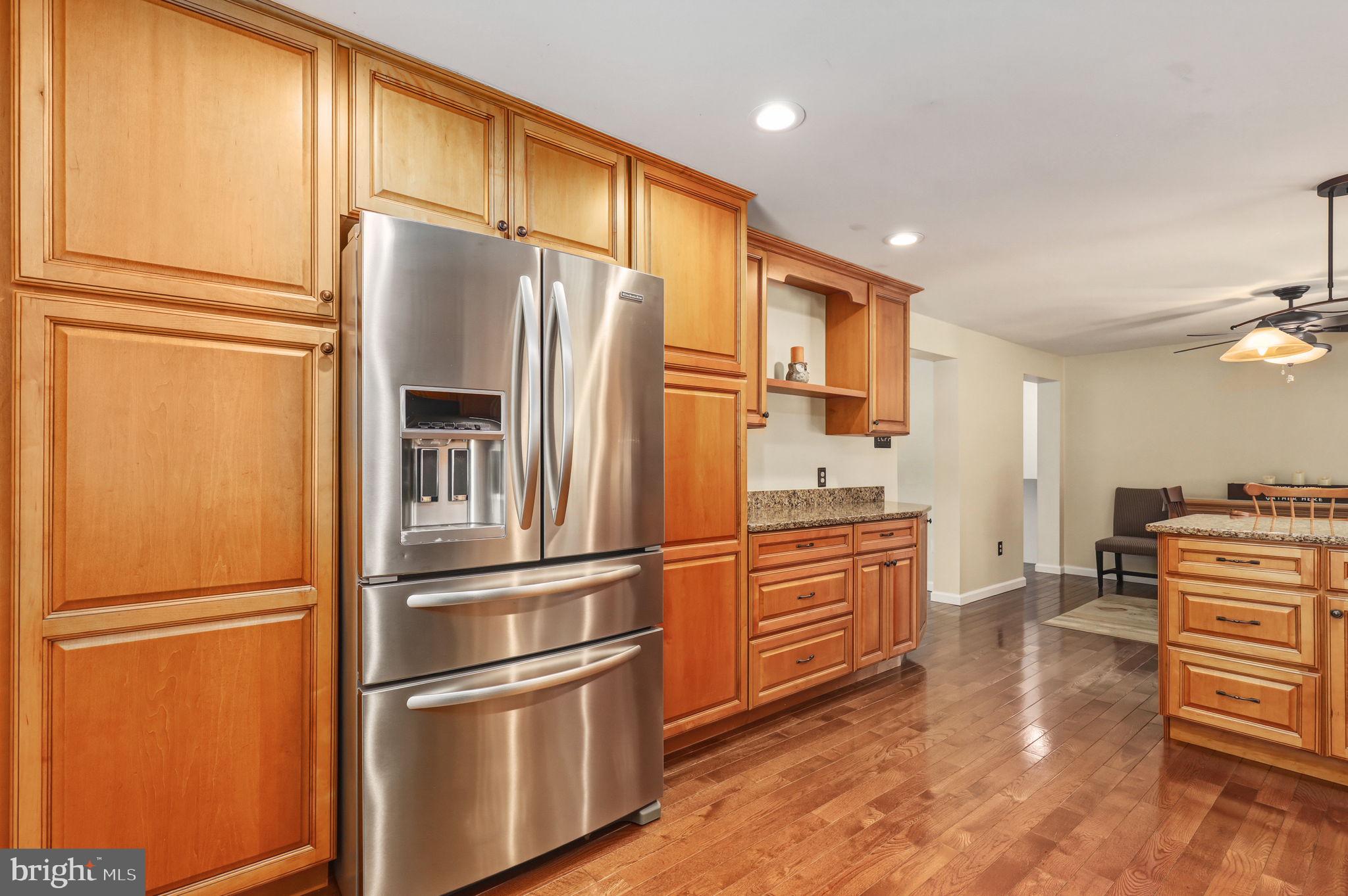 6336 Boyers Mill Road New Market, MD 21774 - Photo 12 of 49 a kitchen with stainless steel appliances a refrigerator stove and sink