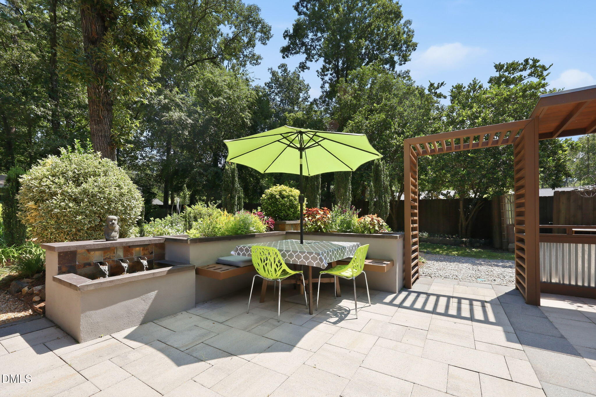 3729 Cambridge Road Durham, NC 27705 - Photo 26 of 49 Backyard with fountain