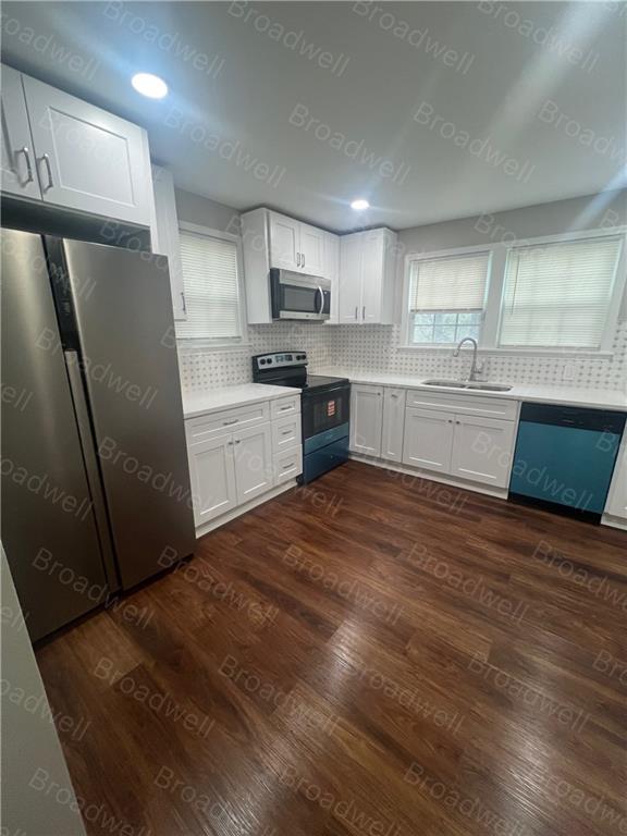 1860 Broadwell Street Southwest Atlanta, GA 30310 - Photo 15 of 23 a kitchen with stainless steel appliances granite countertop a refrigerator sink and microwave