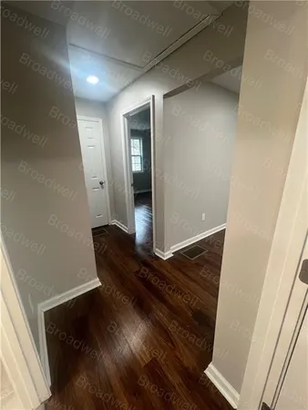 a bathroom with a sink a toilet and bathtub