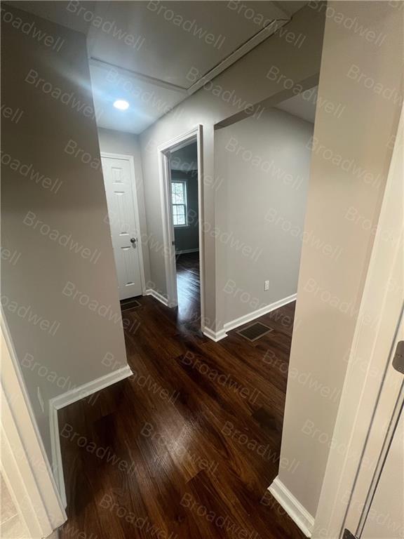 1860 Broadwell Street Southwest Atlanta, GA 30310 - Photo 19 of 23 a view of a hallway and wooden floor