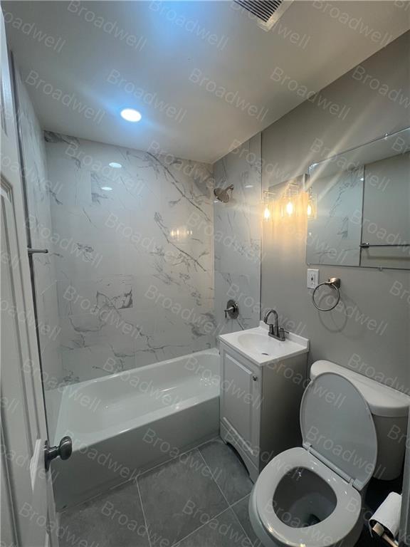 1860 Broadwell Street Southwest Atlanta, GA 30310 - Photo 20 of 23 a bathroom with a sink a toilet and bathtub