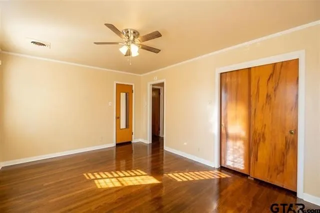 a view of a livingroom with wooden floor