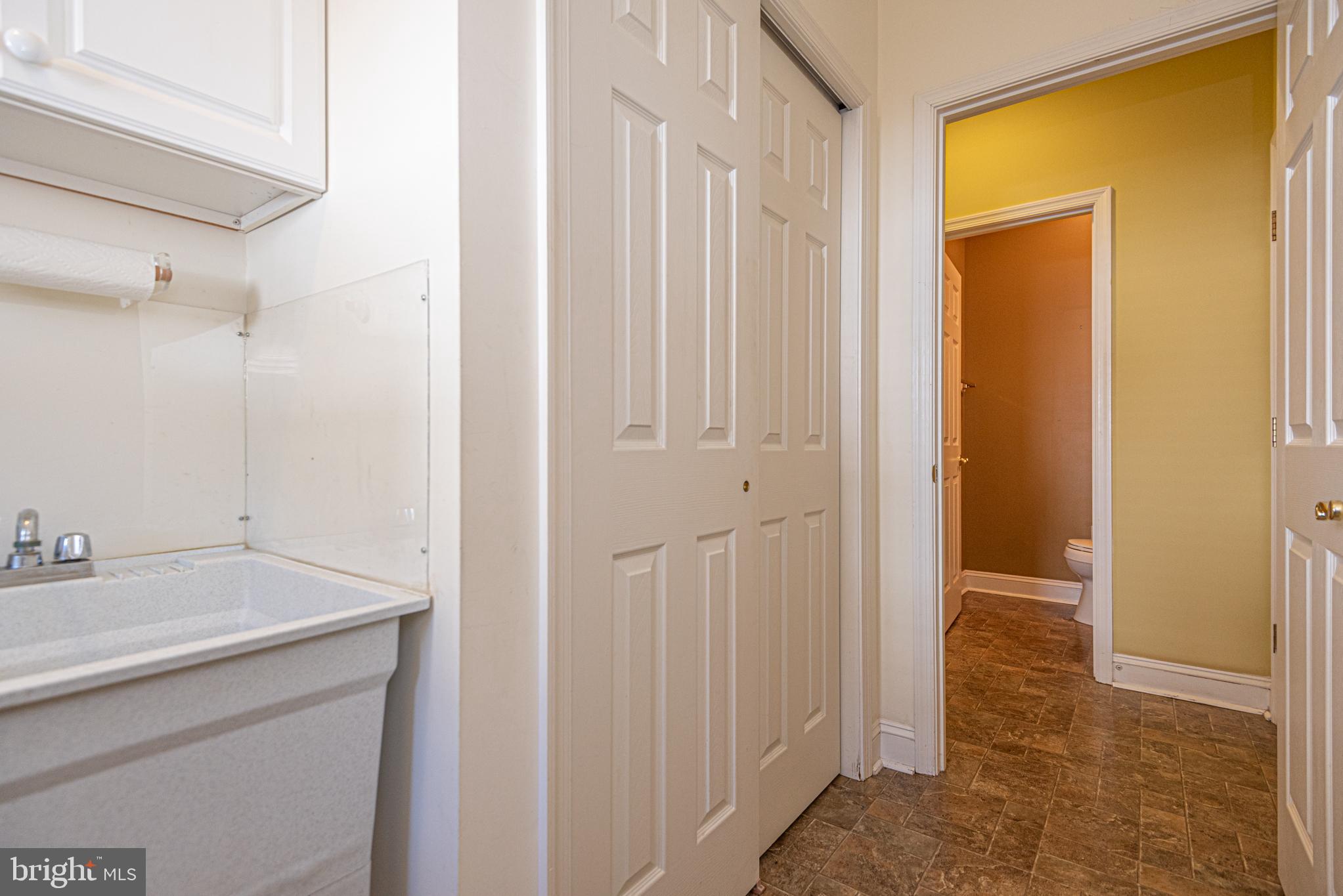6023 Tarry Town Road Salisbury, MD 21801 - Photo 56 of 61 Bright and functional laundry space awaits.
