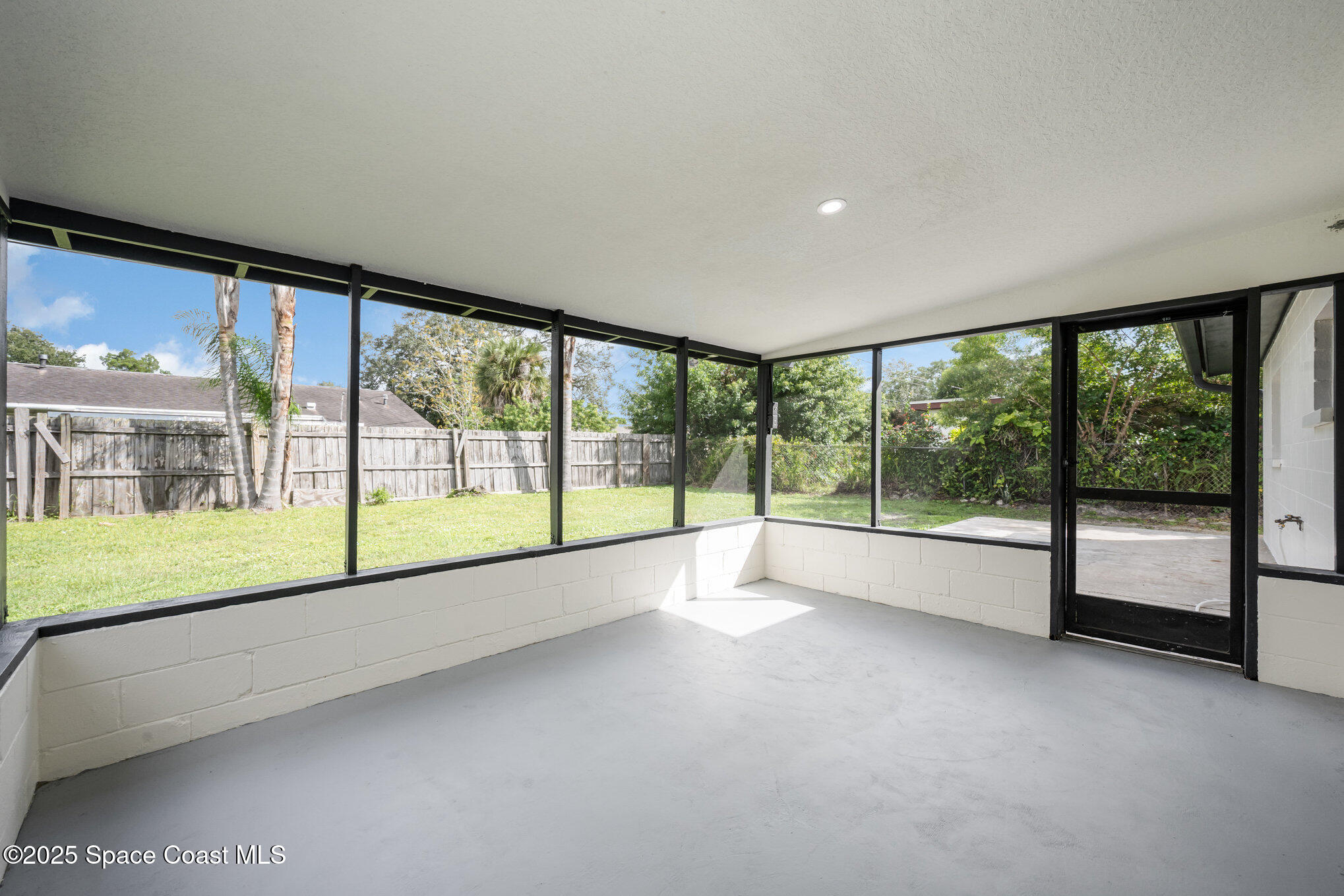 980 Miracle Way Rockledge, FL 32955 - Photo 29 of 33 a view of an empty room with a large window