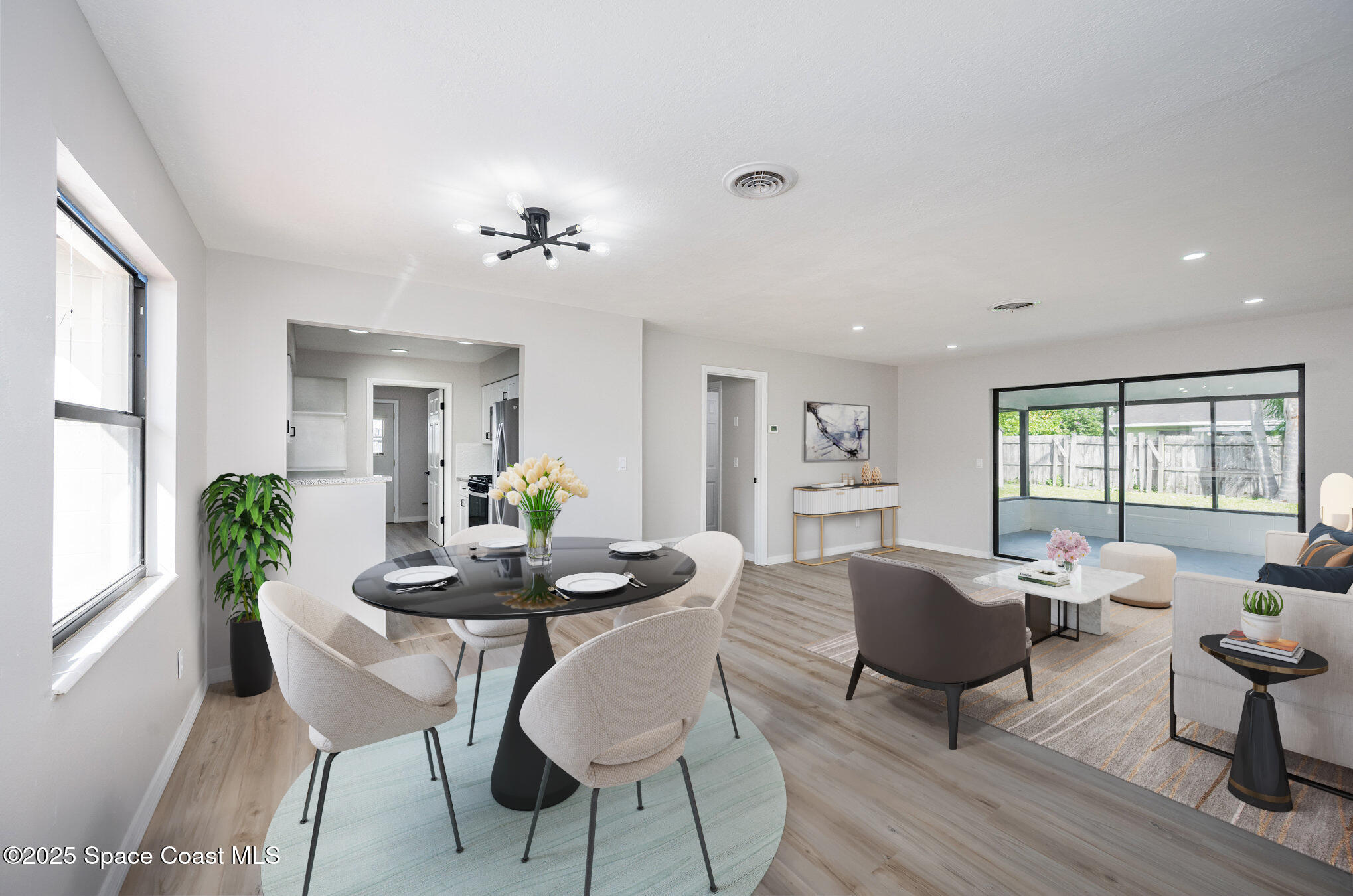 980 Miracle Way Rockledge, FL 32955 - Photo 5 of 33 a view of a dining room with furniture window and outside view