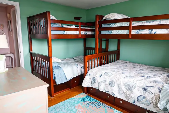 a bedroom with bunk bed